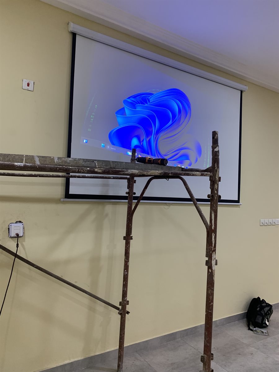 Projected Windows desktop on a classroom screen during testing.